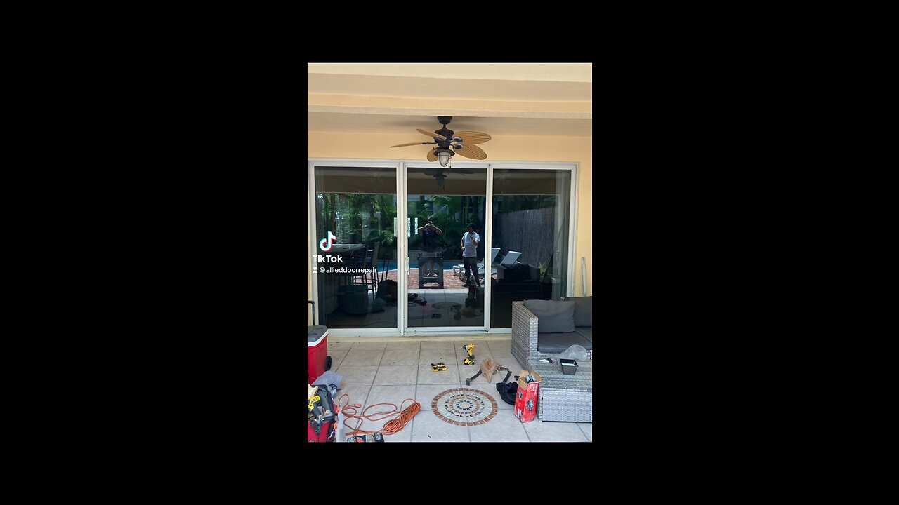 Hurricane impact sliding glass door repair; roller replacement and track refurbishing