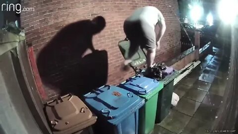 Fella Climbs In Bin And Takes A Fall