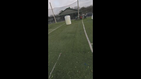 Shane being shot with paintballs