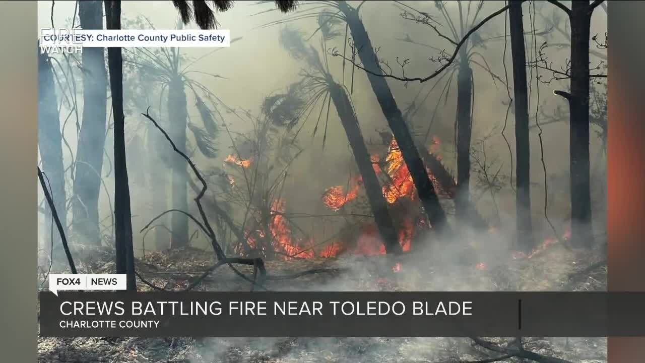 A brush fire shuts down westbound lanes on Toledo Blade