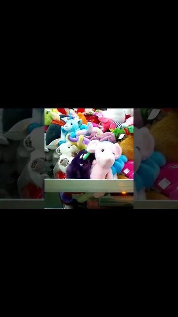 pegando urso de pelucia na maquina (4)