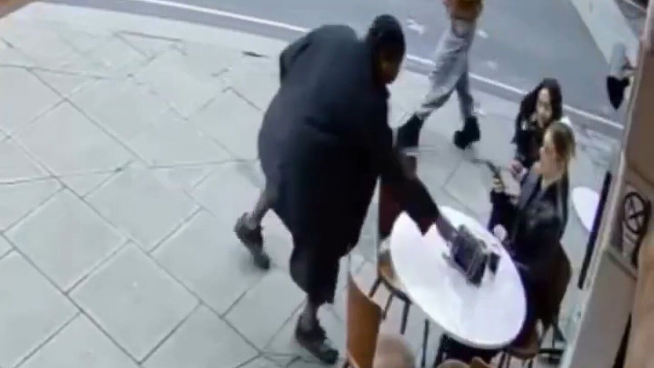 Black Woman Walks Up To Two White Women And Steals A Purse, Then Tries To Toss Their Coffee On Them