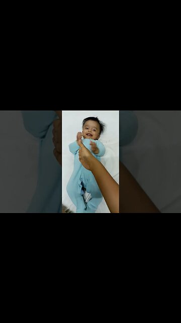 4 months old baby shaking his own hands