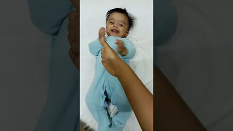 4 months old baby shaking his own hands