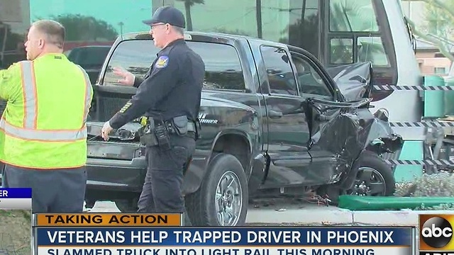 Veterans help driver trapped after crash with light rail