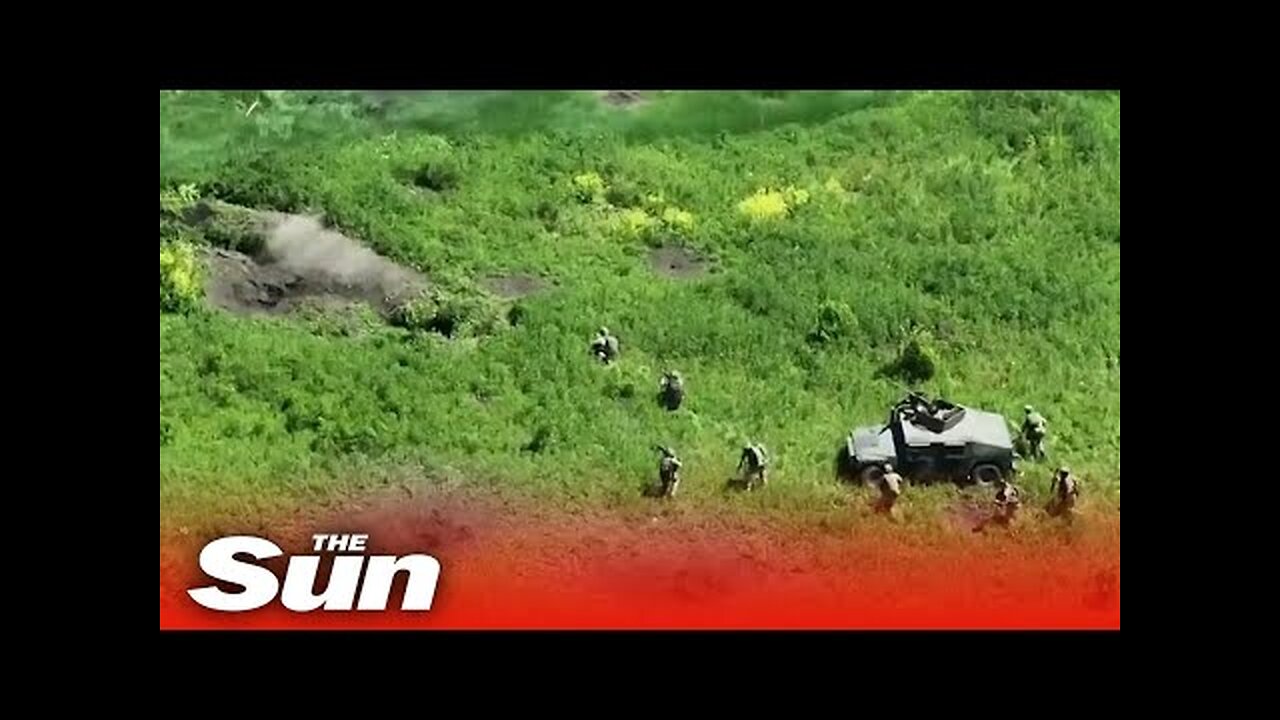 Incredible video shows Ukrainian soldiers in Humvees storming Russian trenches