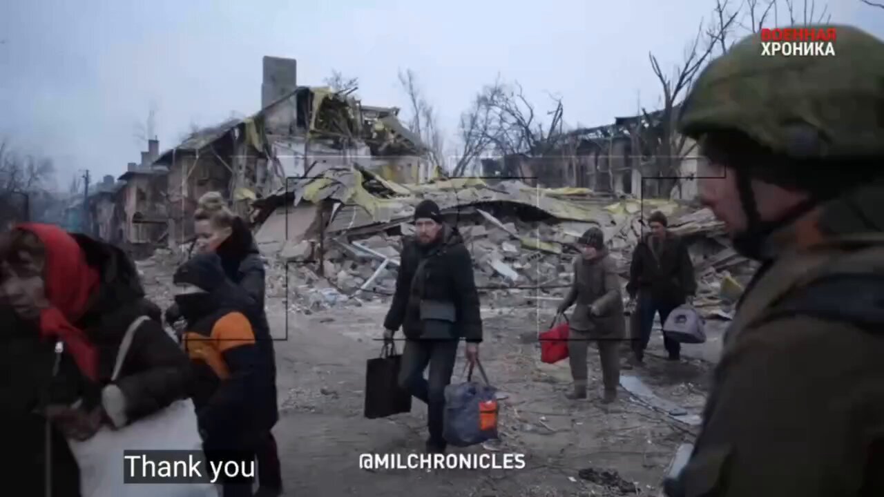 Civilians thank Russian soldiers as they leave