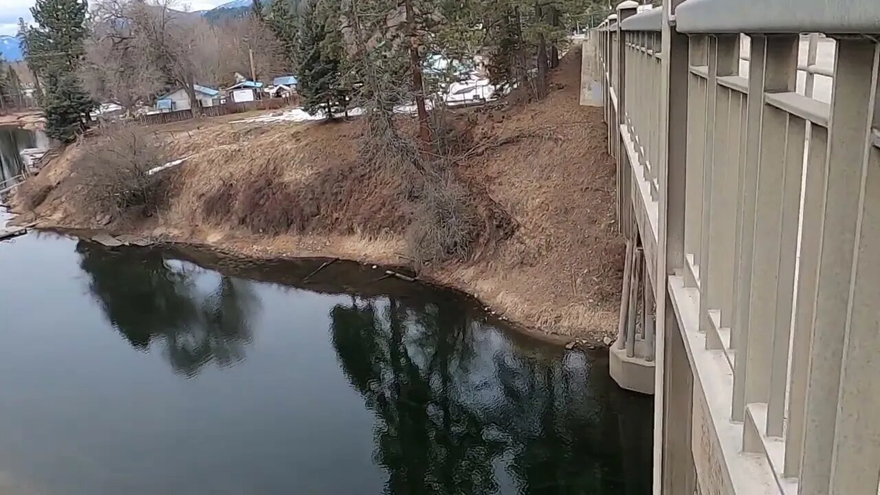 Walking on the outer edge of the Christina Bridge.