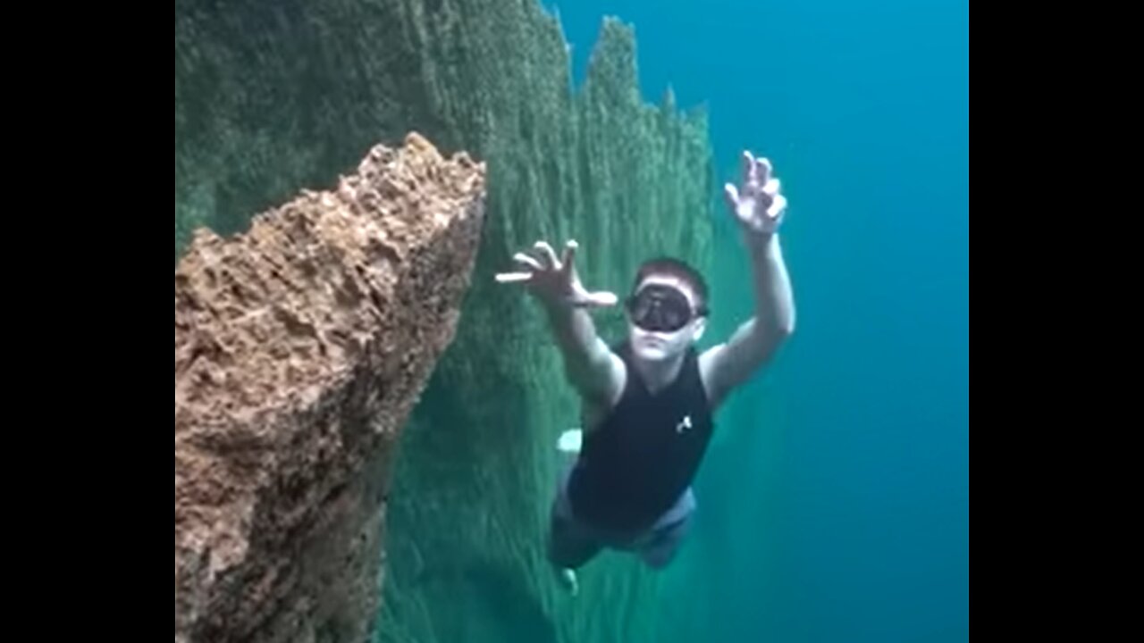 Falling Off An Underwater Cliff