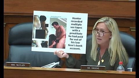 Marjorie Taylor Greene holds up censored photo of Hunter Biden and a prostitute