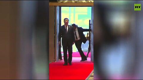 SECURITY GUARD BLOCKS AIDE TO XI JINPING AT BRICS SUMMIT