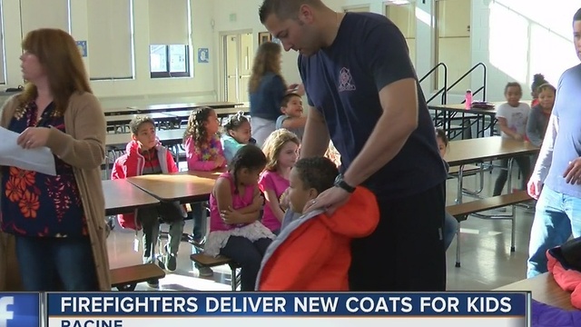 Racine elementary students get free coats from Operation Warm