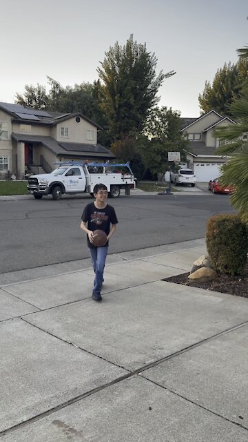 Dylan practicing some shots in the drive way.