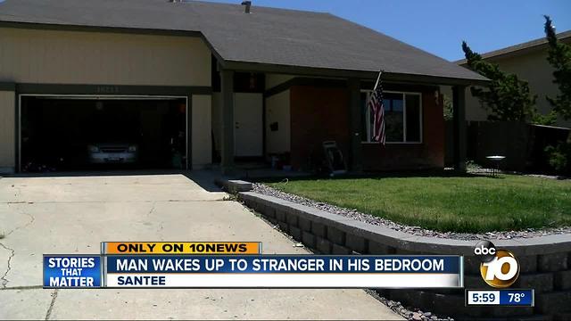 Man wakes up to stranger in his bedroom