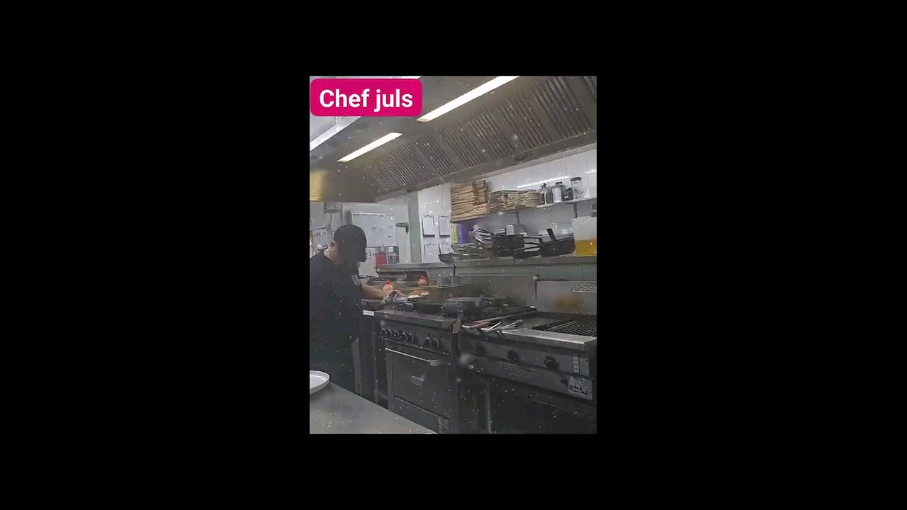 Chef Juls cooking in kitchen