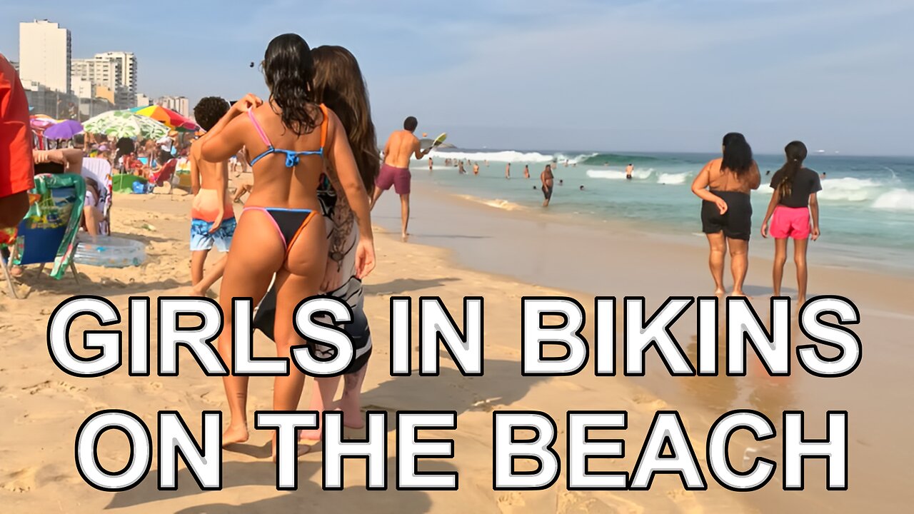 GIRLS IN BIKINS ON THE BEACH