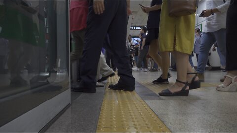 Riding the Korean subway.