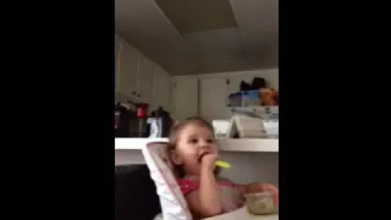 Laughing Baby Bella Learning to Eat with a Spoon