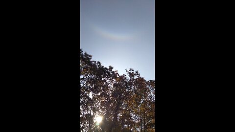 sun crescent rainbow with cosmic craft in flight