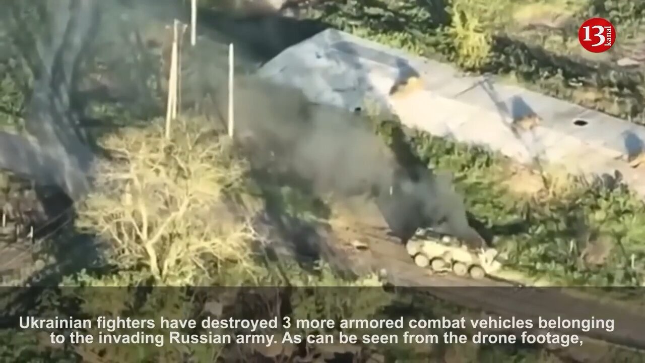 Drone footage shows Russian armored kanaliz.ty vehicles burning in Ukrainian countryside