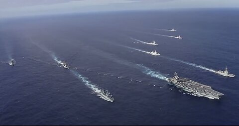 Carrier Strike Group Drops Anchor; Defies Biden Regime! | Real Raw News