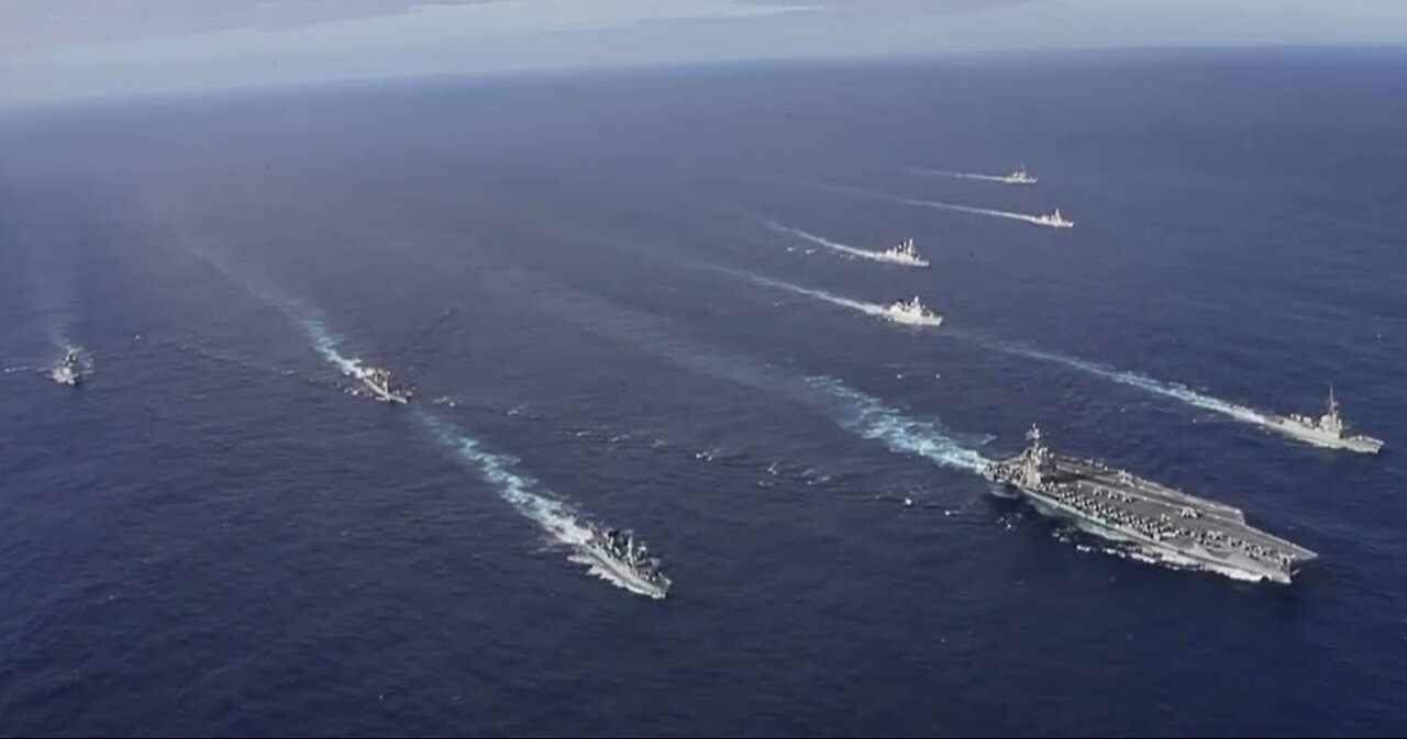 Carrier Strike Group Drops Anchor; Defies Biden Regime! | Real Raw News