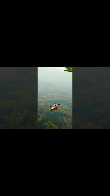 Drone shot of kayak in the river