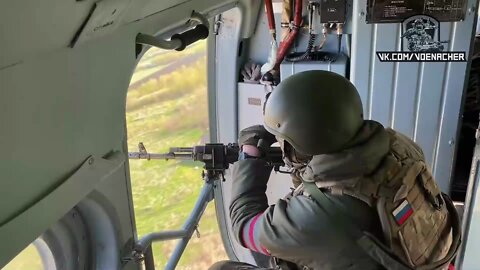 Inside a helicopter accompanying Russian military convoys in Ukraine