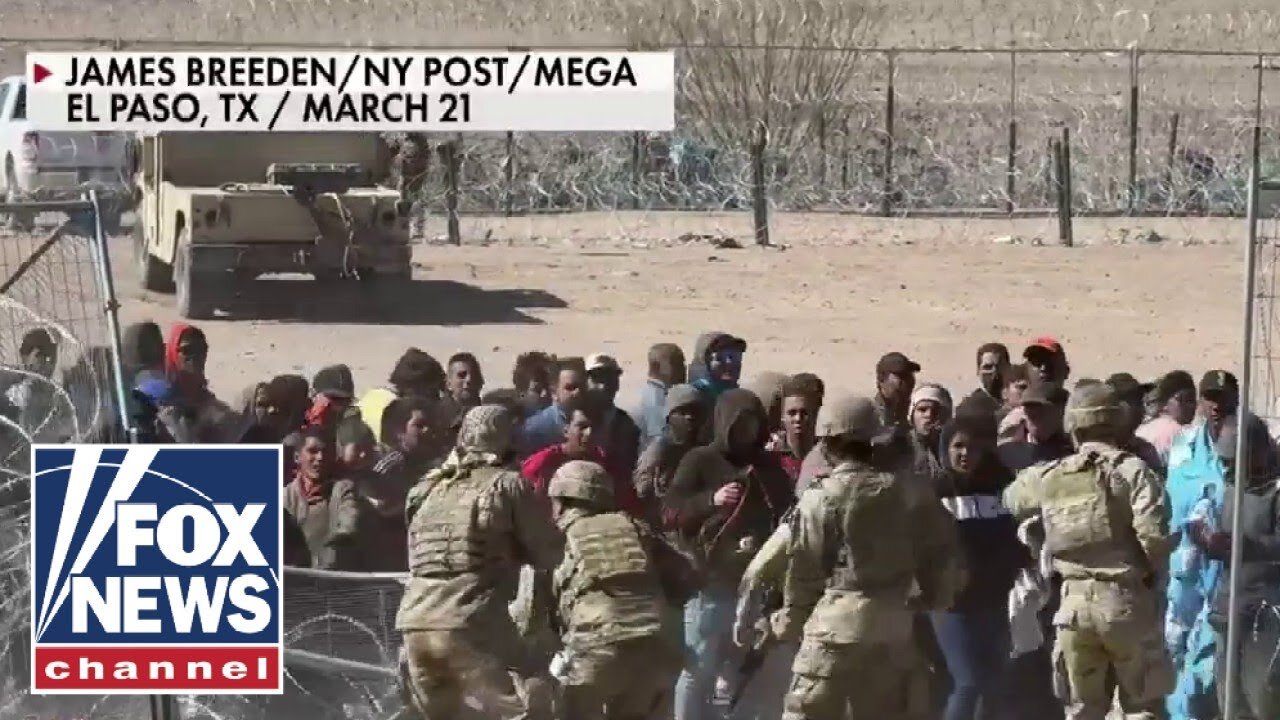 222 migrants charged with inciting a riot after storming border