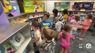 Generous donor gifts hundreds of books to elementary school students in wife's honor