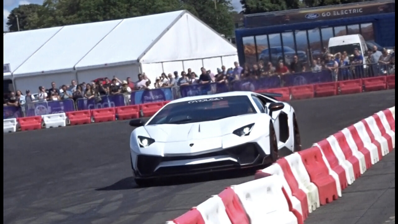 LAMBORGHINI AVENTADOR SV with GINTANI F1 V12 EXHAUST ACCELERATING AT THE BRITISH MOTOR SHOW