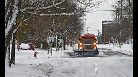 Snow covers roads and houses in Northeastern Wisconsin