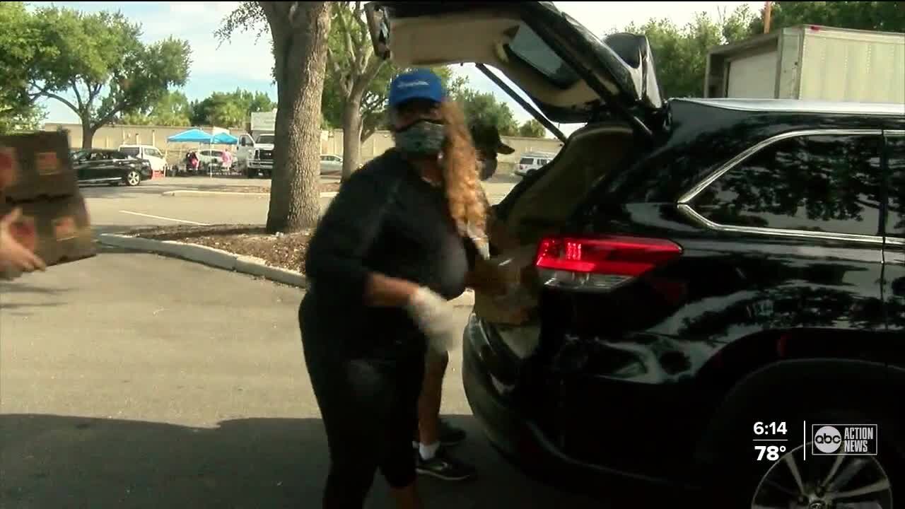 BayCare and Feeding Tampa Bay team up to fill trunks with food in Polk County