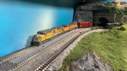 N Scale UP train leaving the tunnel pass