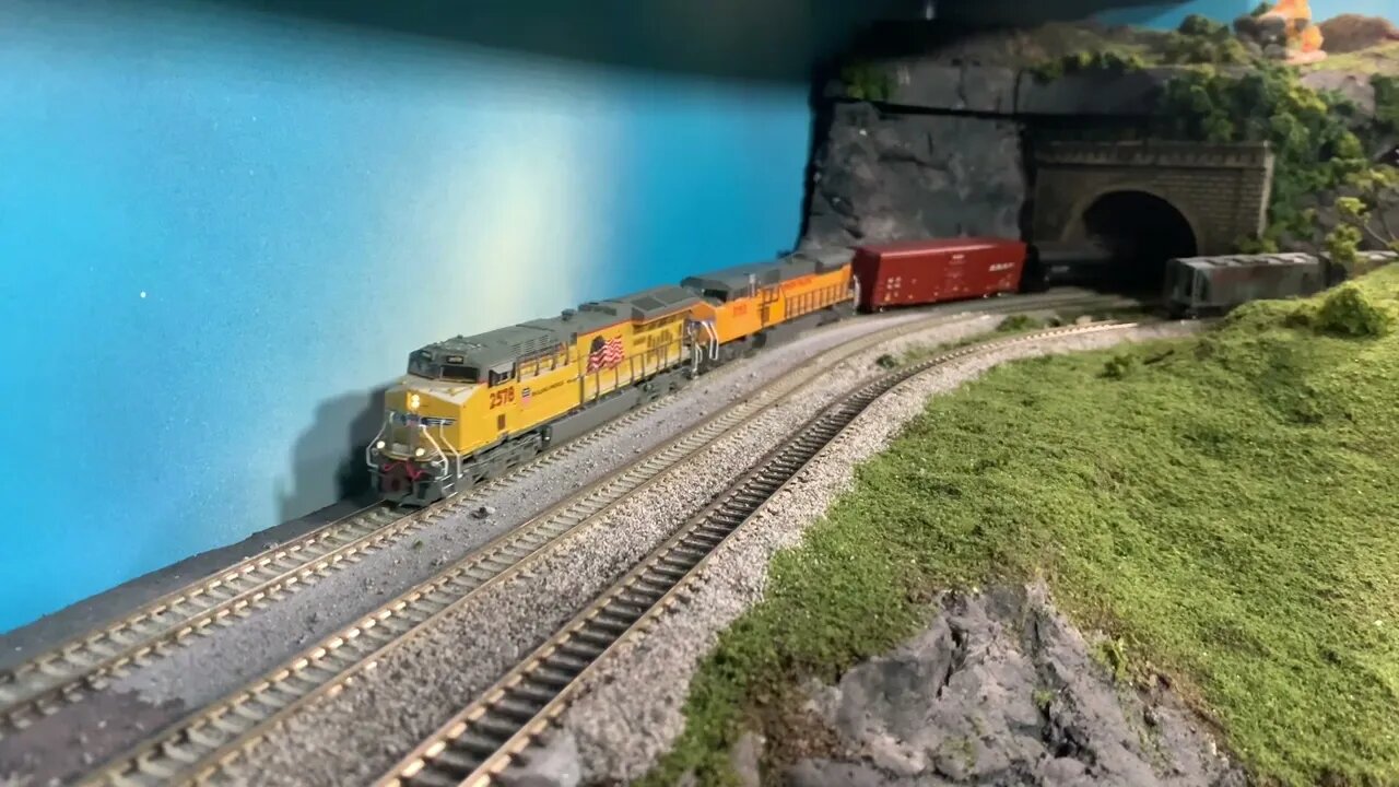 N Scale UP train leaving the tunnel pass