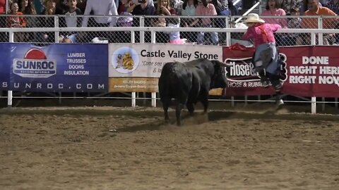 Editorial rodeo clown teases giant bull at a PRCA rodeo