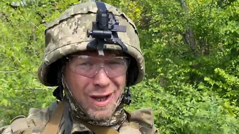 Ukrainian journalist interviews soldier with a Nazi black sun patch