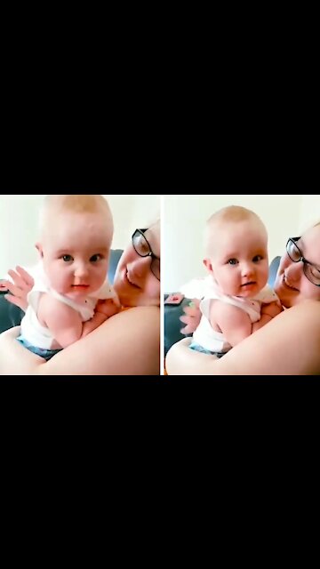 Cute Baby On His Mother's Lap, Rubbing Her Face