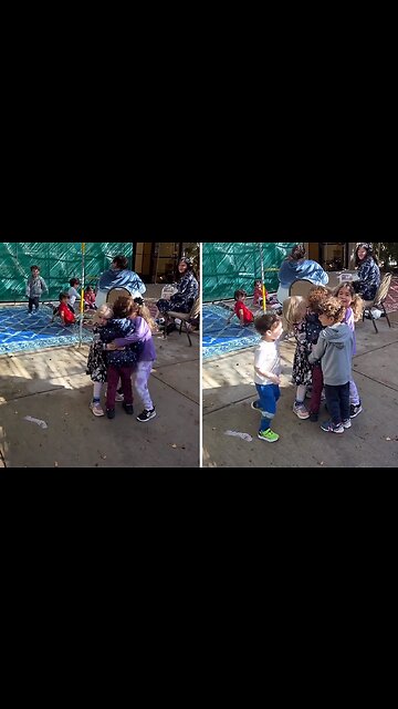 Classmates embrace kid after returning from hospital for his twin brother