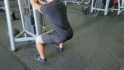 Glute Band Abductions from Supported Squat Hold