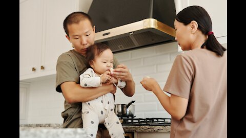 Funny Asian Kid Playing with Chopped Fruits
