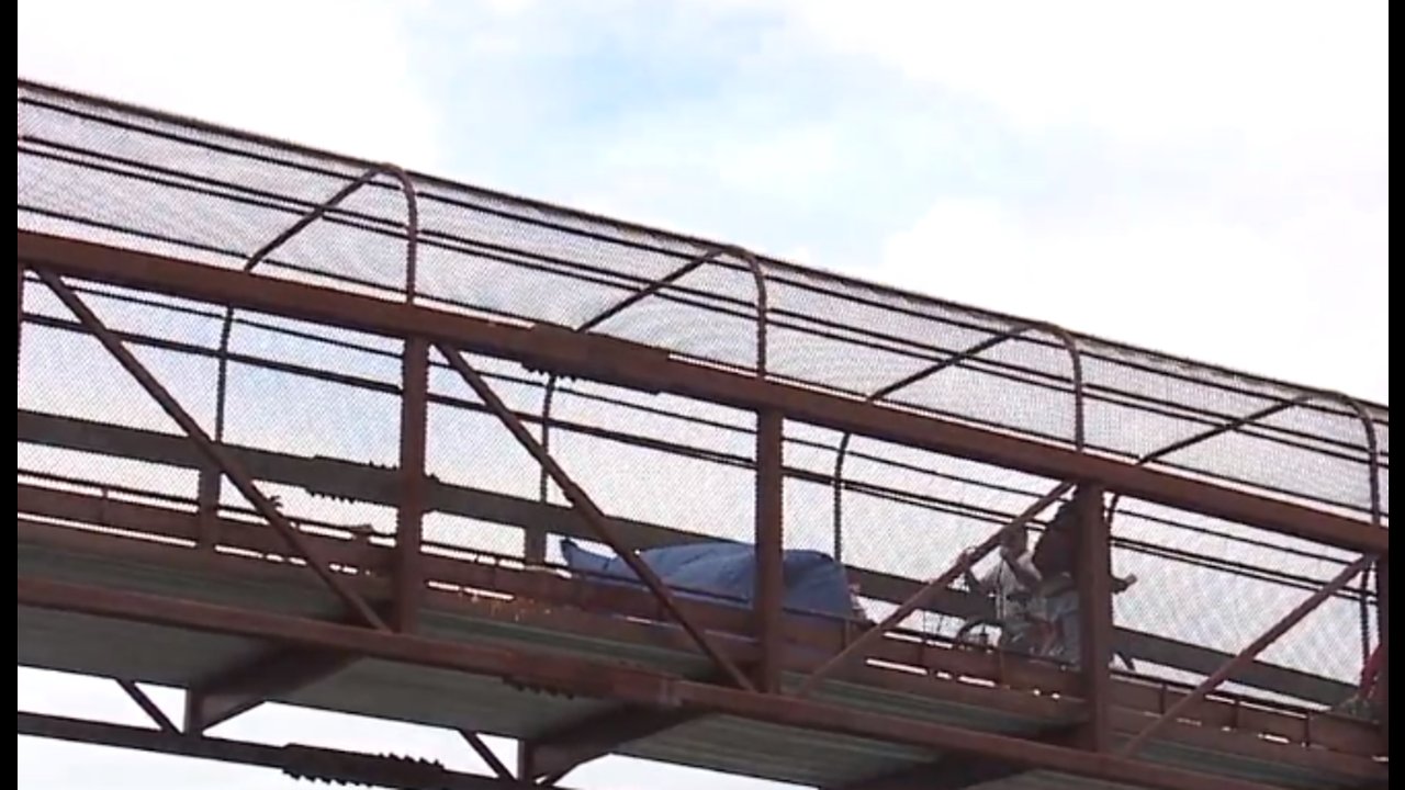 Homeless camp taking over pedestrian bridge in east Las Vegas