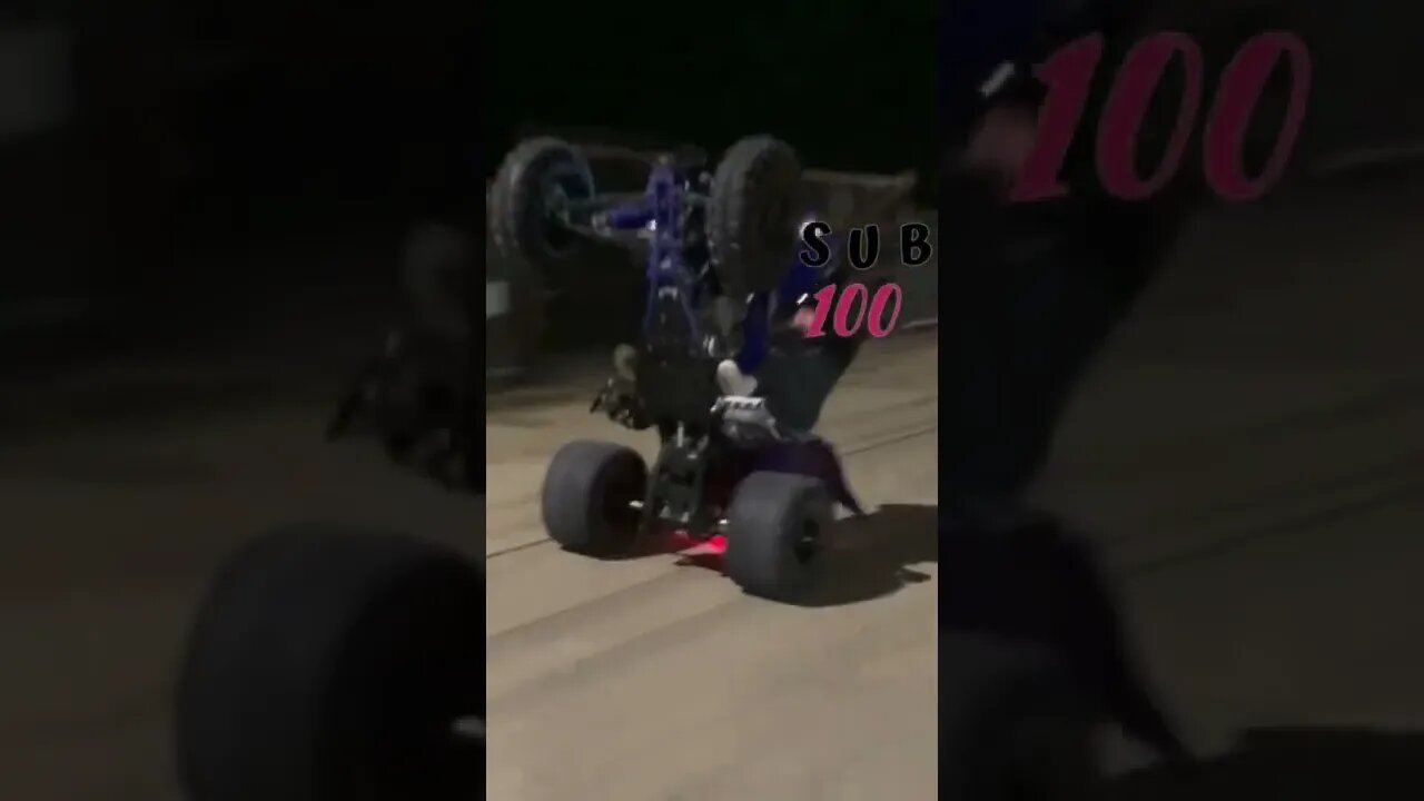 QUAD YAMAHA RAPTOR WHEELIE