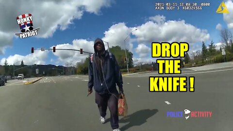 MAN PULLS KNIFE ON COP. COP SHOOTS MAN !