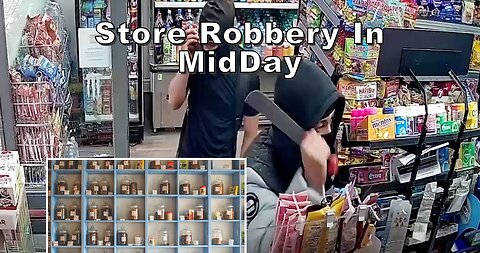 Moment have-a-go hero shopkeeper traps machete-wielding robbers inside shop