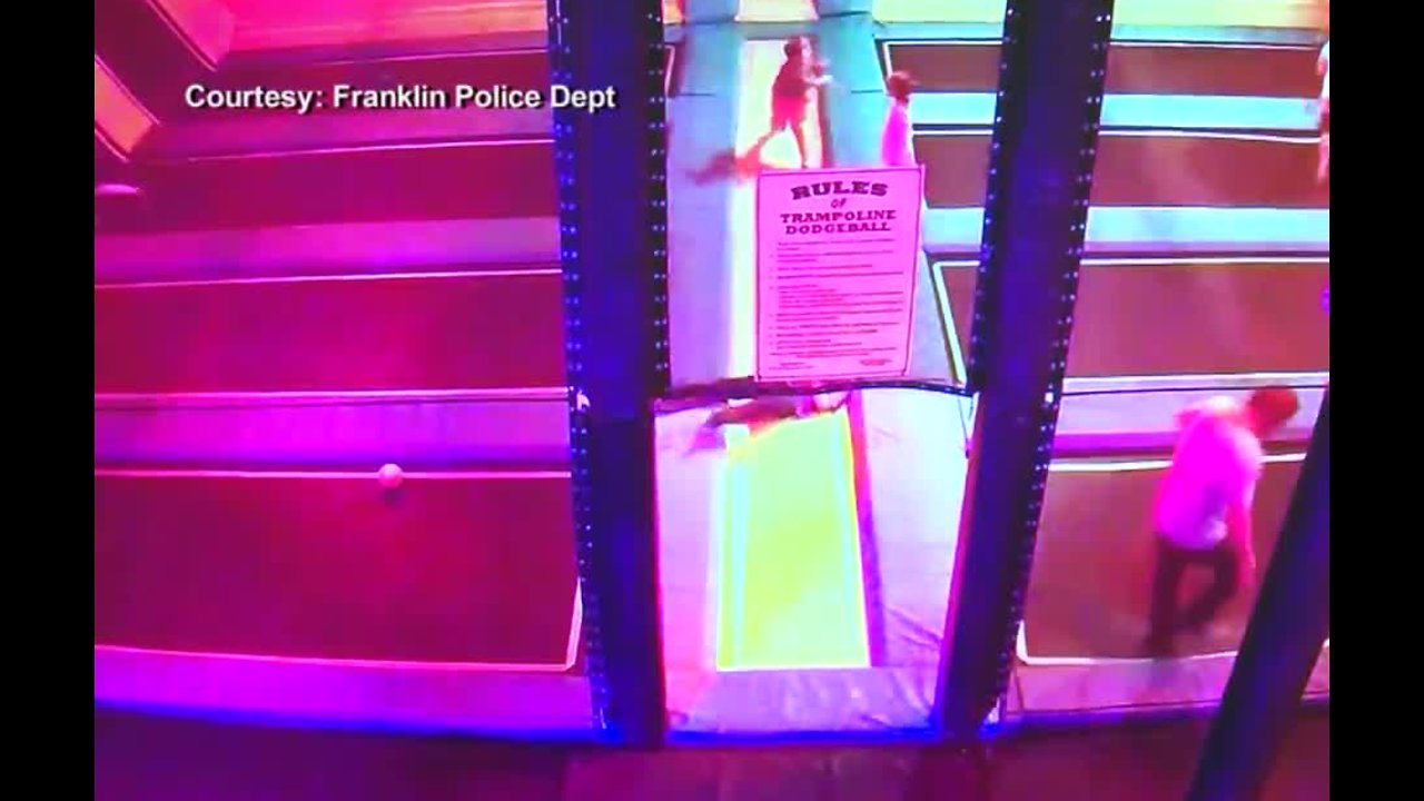 Man throws balls at kids at trampoline park