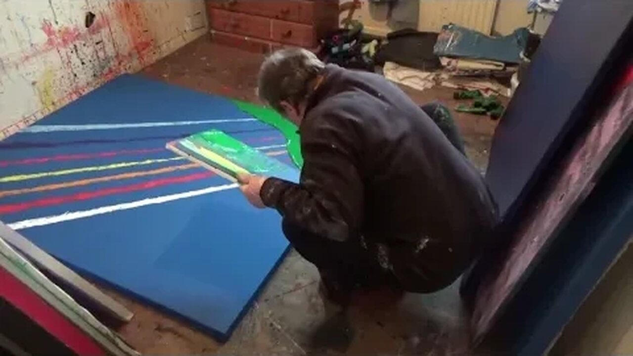 Finger painting a green field of colours