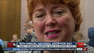 Family celebrates their 6th adopted child