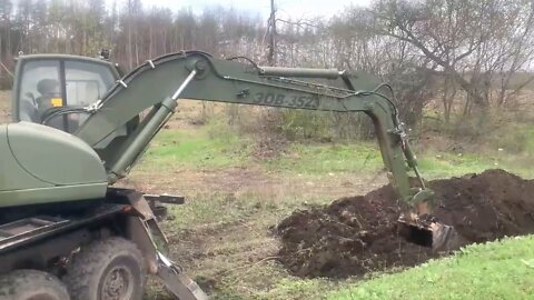 Russian servicemen operate a checkpoint in the Kharkov region