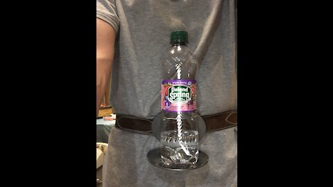 The BevBuckle for your belt Holds your bottle or can so you can be hands free